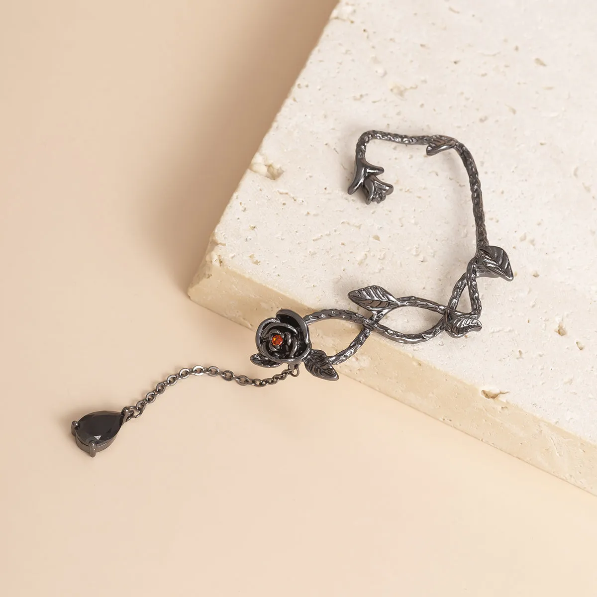 Black Crystal & Rhodium-Plated Rose Drop Ear Cuffs