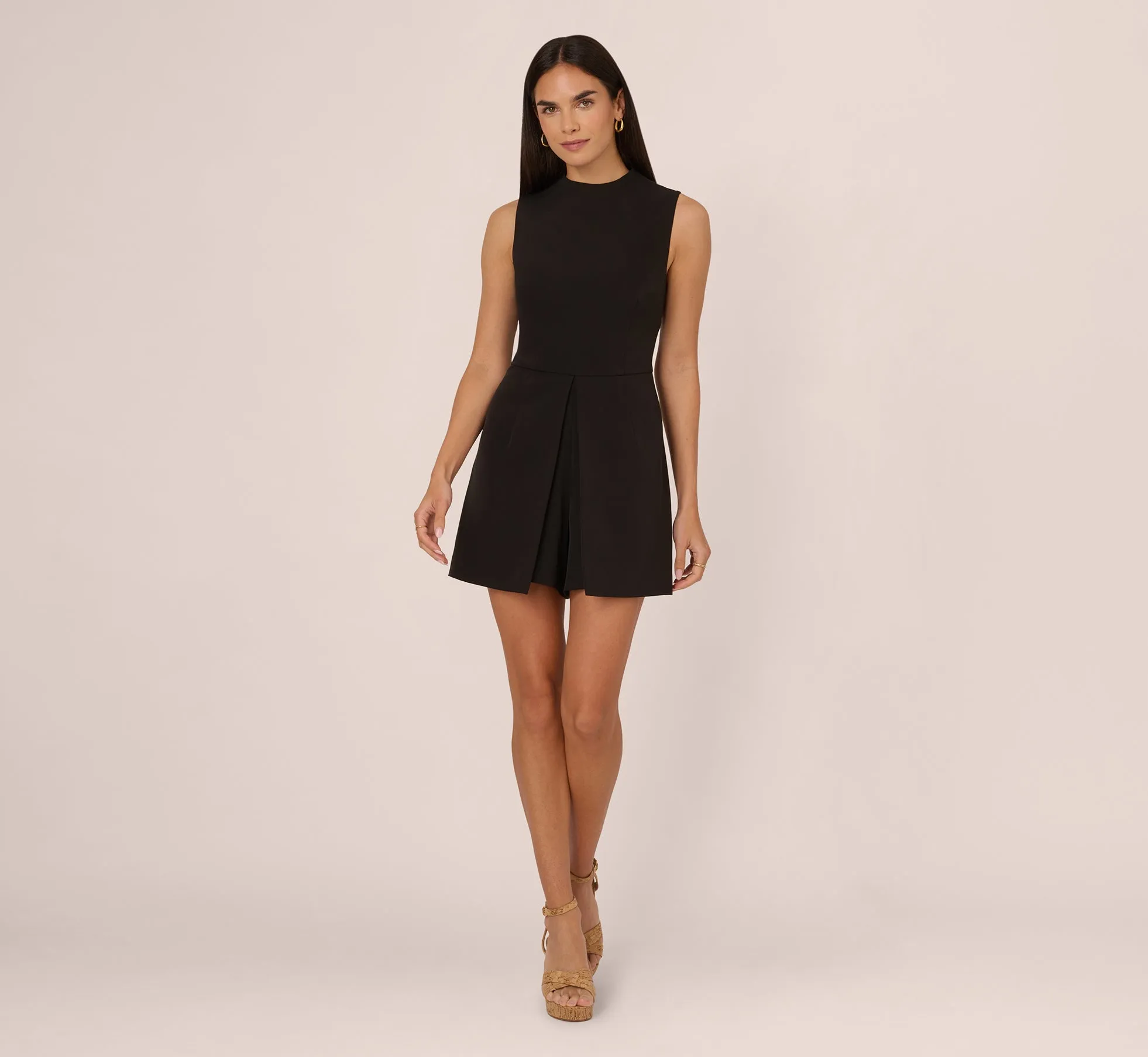 Sleeveless Romper With Peplum Hem In Black