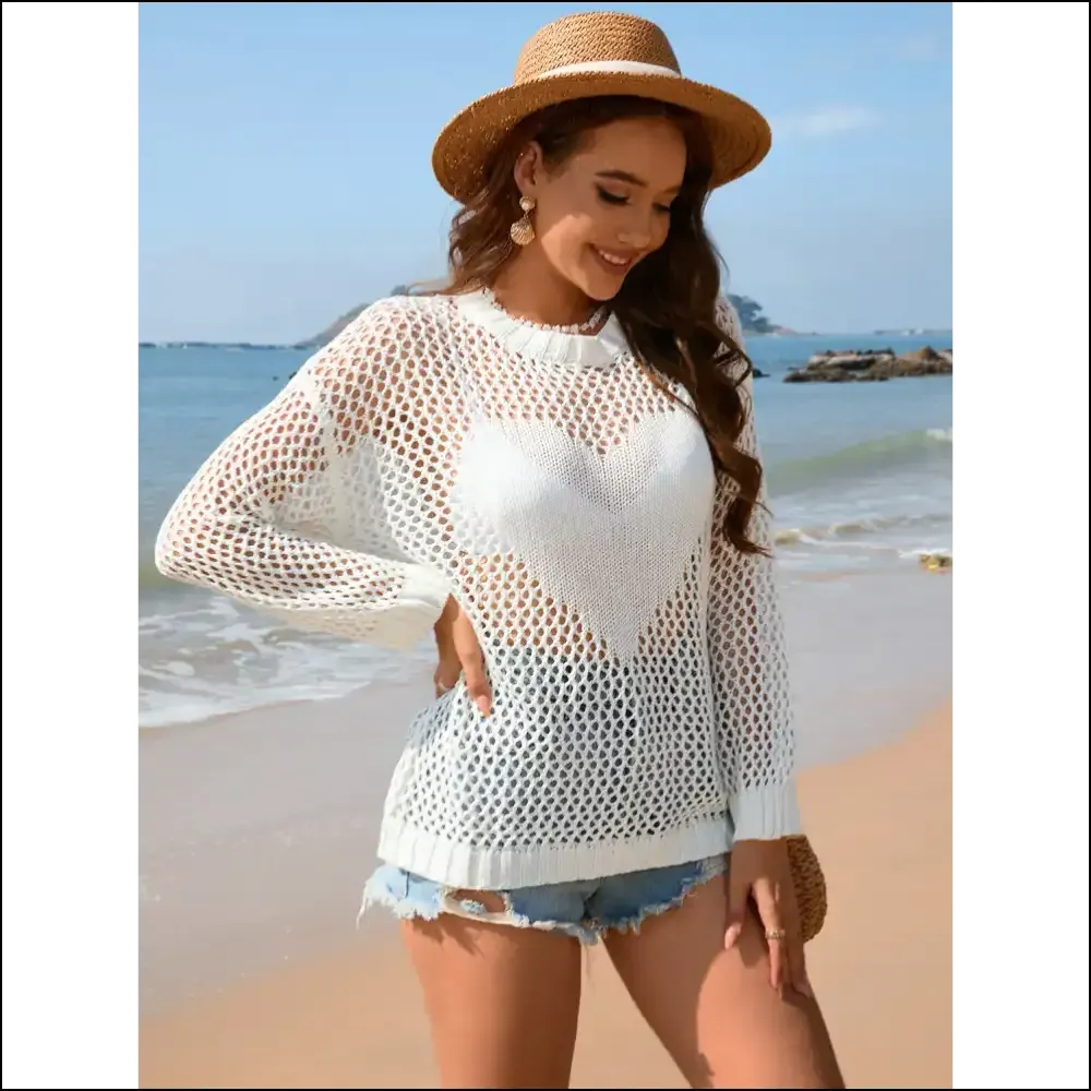 Unleash your Inner Diva with our Heart Openwork Long Sleeve Cover-up 💖