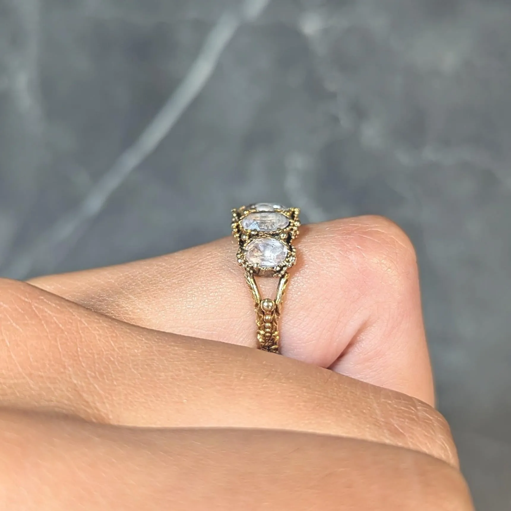 Victorian Etruscan Revival 1.90 CTW White Topaz 18 Karat Yellow Gold Antique Five Stone Band Ring